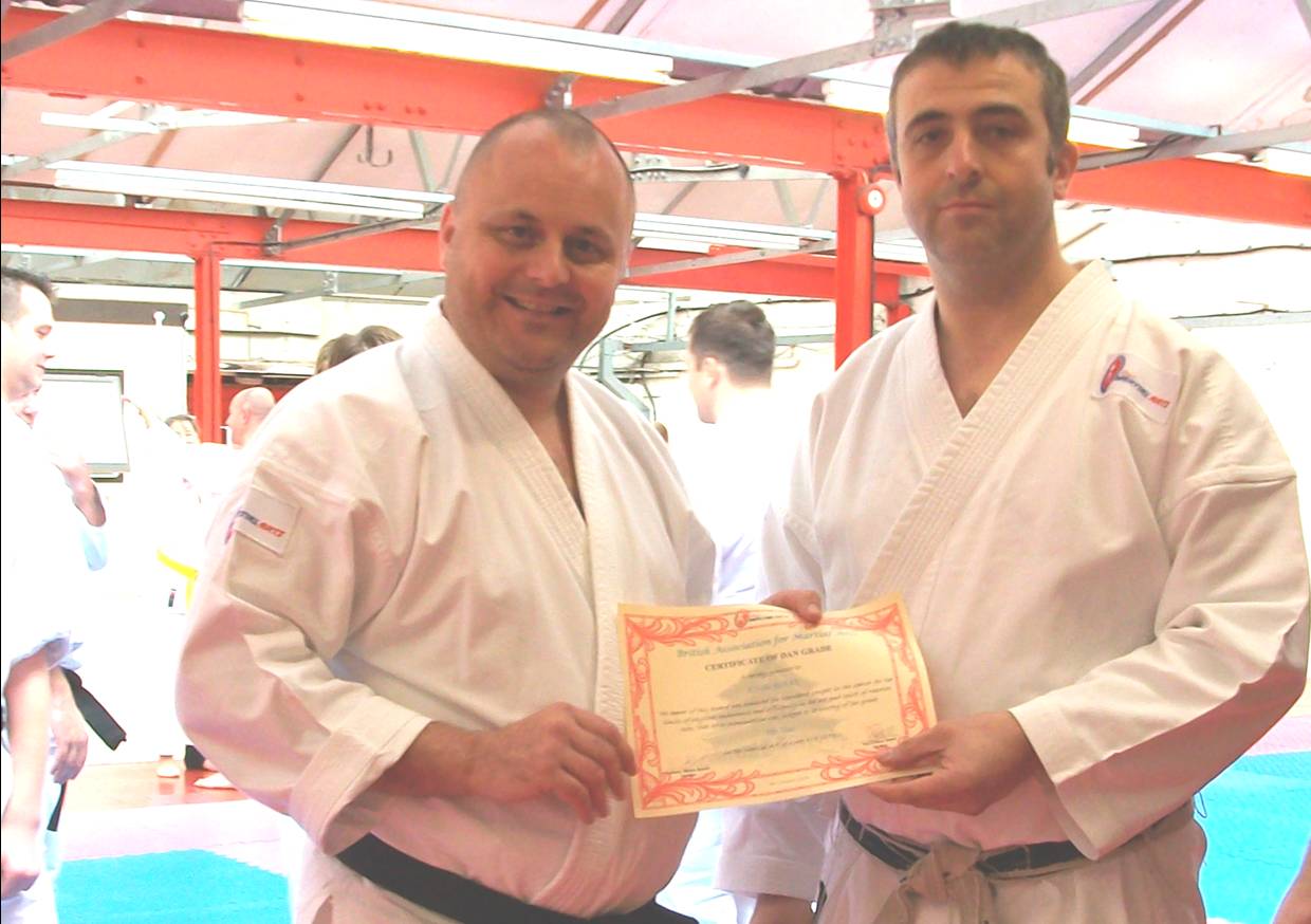 surprised John Burke sensei gets his 5th Dan awarde by Anthony Blades renshi